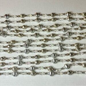 Garland for any occasion, silver and clear iridescent, beating hand strung